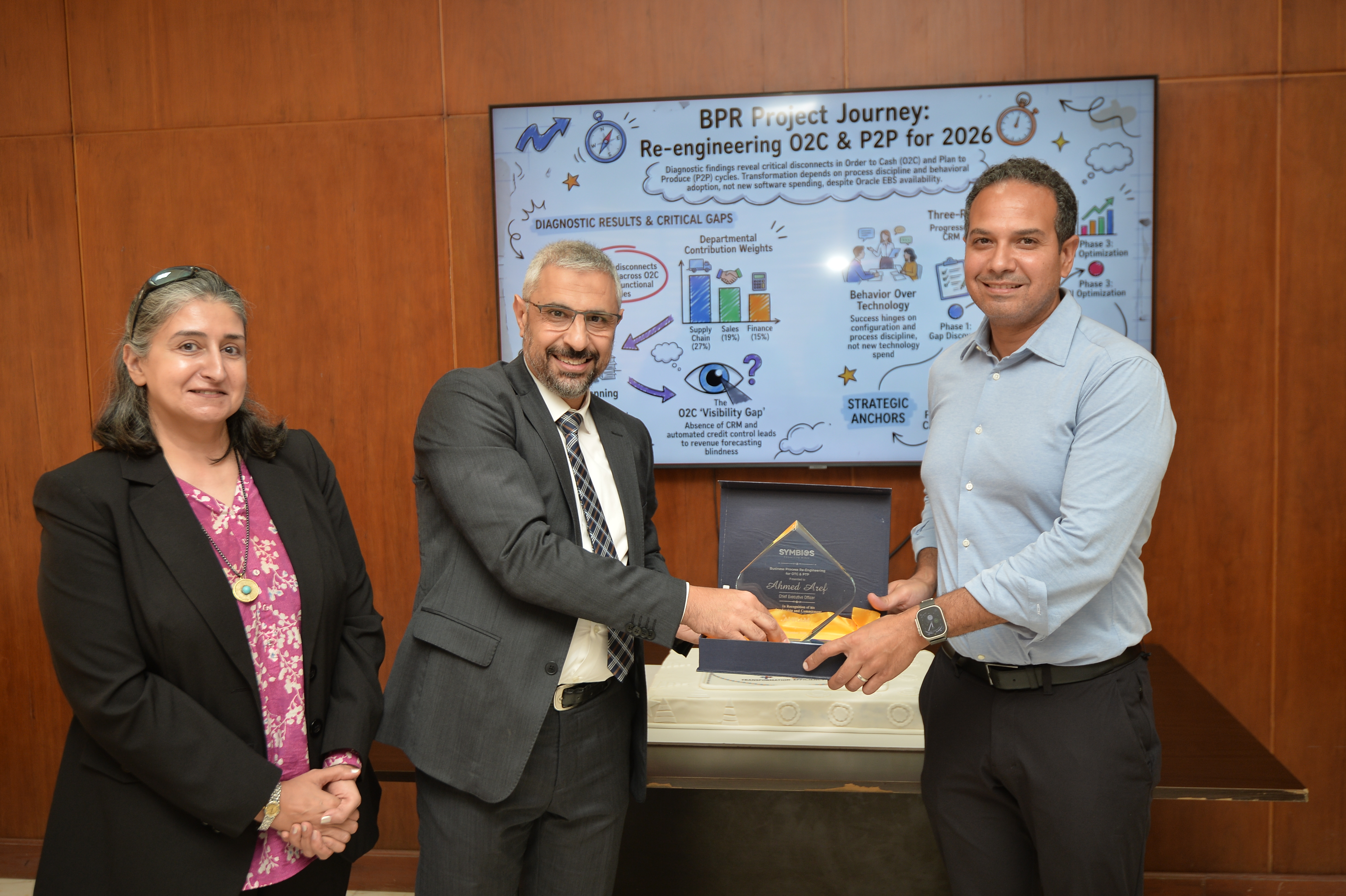 Additional photograph from the Symbios–ASG project closure event, image 5